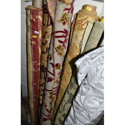 503 - ELEVEN ROLLS OF ASSORTED UPHOLSTERY AND CURTAIN FABRIC, mostly floral designs (s.d) (11 rolls)