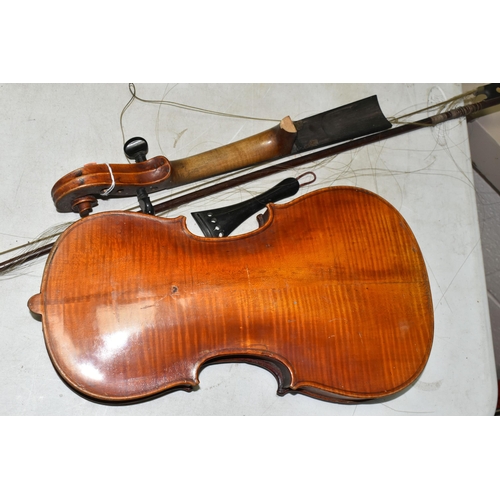 517 - A VIOLIN IN NEED OF ATTENTION, two piece back, no visible maker's label but bears a label reading 'd... 