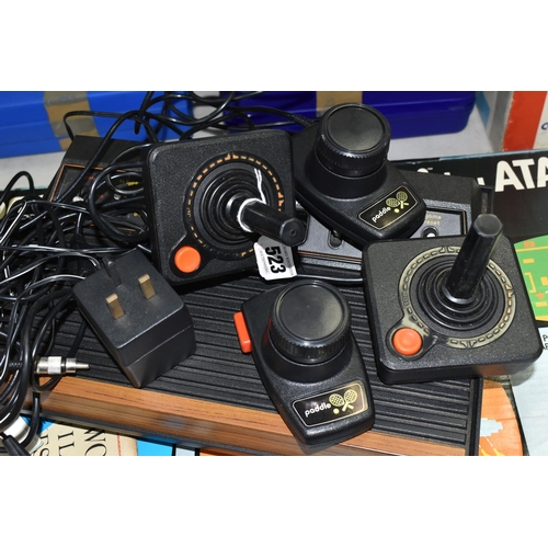 523 - ATARI VCS BOXED, includes power supply and controllers but no games, everything untested, with nine ... 