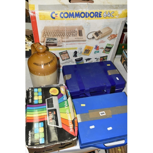 524 - COMMODORE 64 COMPUTER BOXED WITH GAMES, computer is in working condition (see photo, television not ... 