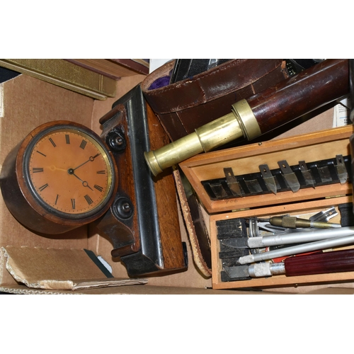 525 - A BOX OF BOOKS, DOLL, CLOCK, TELESCOPE AND SUNDRY ITEMS, to include  a cased 19th century telescope,... 