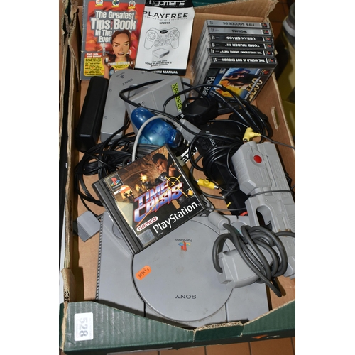 528 - PLAYSTATION CONSOLE WITH GAMES AND ACCESSORIES, includes The World Is Not Enough, Jungle Book Groove... 