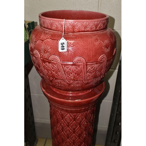 549 - A LARGE RED BURMANTOFT JARDINIERE AND A SIMILAR COLOURED STAND, impressed marks to the base of the j... 