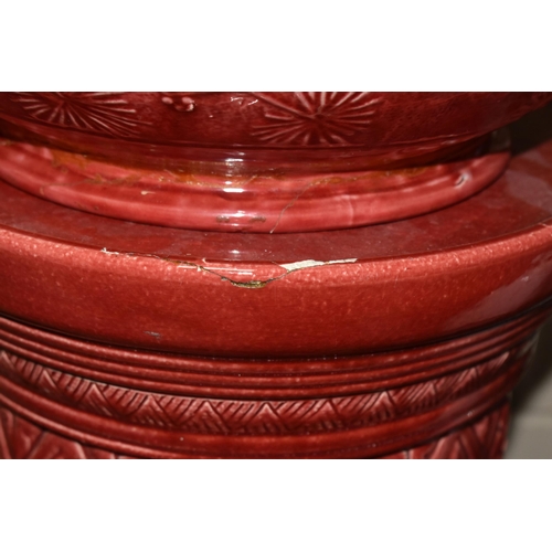 549 - A LARGE RED BURMANTOFT JARDINIERE AND A SIMILAR COLOURED STAND, impressed marks to the base of the j... 