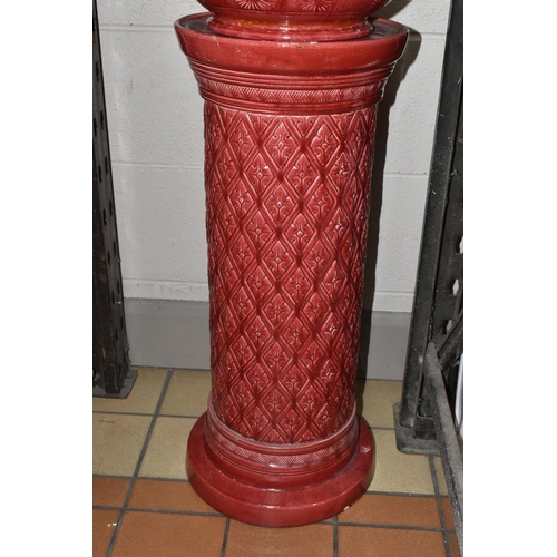 549 - A LARGE RED BURMANTOFT JARDINIERE AND A SIMILAR COLOURED STAND, impressed marks to the base of the j... 