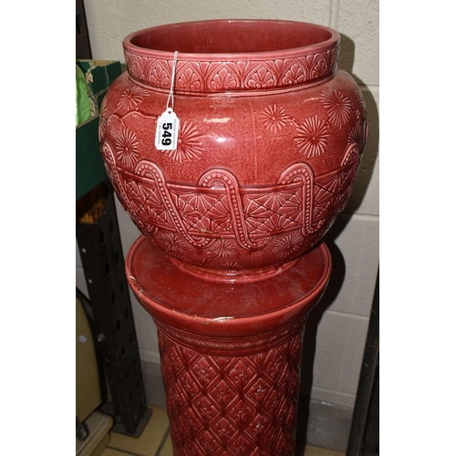 549 - A LARGE RED BURMANTOFT JARDINIERE AND A SIMILAR COLOURED STAND, impressed marks to the base of the j... 