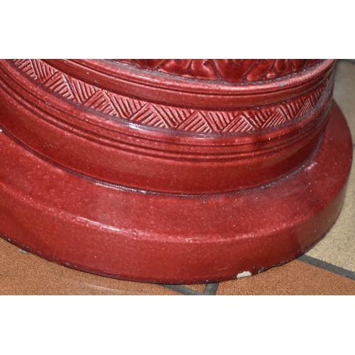 549 - A LARGE RED BURMANTOFT JARDINIERE AND A SIMILAR COLOURED STAND, impressed marks to the base of the j... 