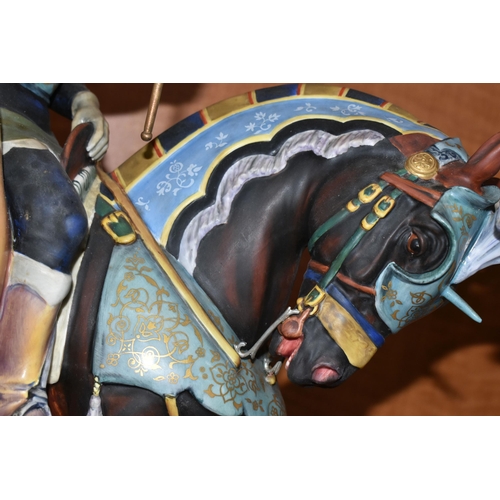 713 - A ROYAL DOULTON LIMITED EDITION EQUESTRIAN FIGURE 'THE PALIO KNIGHT' HN2428, no.63/ 500, mounted on ... 