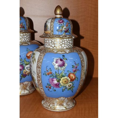 715 - A PAIR OF LATE 19TH CENTURY AUGUSTUS REX PORCELAIN JARS AND COVERS OF BALUSTER FORM, painted with pa... 