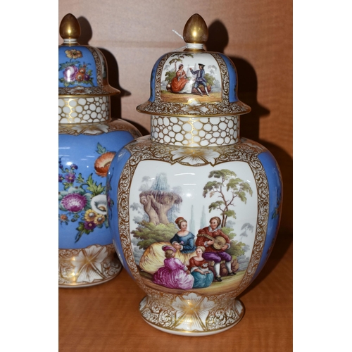 715 - A PAIR OF LATE 19TH CENTURY AUGUSTUS REX PORCELAIN JARS AND COVERS OF BALUSTER FORM, painted with pa... 