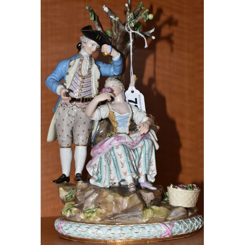 721 - A LATE 19TH CENTURY MEISSEN PORCELAIN FIGURE GROUP OF A COURTING COUPLE BENEATH A TREE WITH FLOWERS,... 