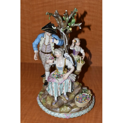 721 - A LATE 19TH CENTURY MEISSEN PORCELAIN FIGURE GROUP OF A COURTING COUPLE BENEATH A TREE WITH FLOWERS,... 