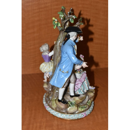 721 - A LATE 19TH CENTURY MEISSEN PORCELAIN FIGURE GROUP OF A COURTING COUPLE BENEATH A TREE WITH FLOWERS,... 