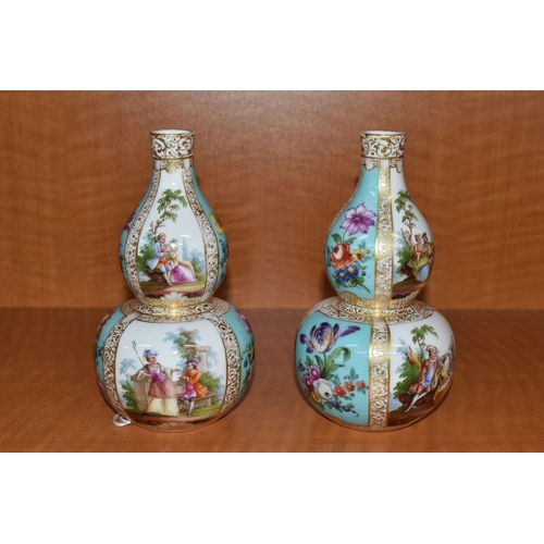 724 - A PAIR OF LATE 19TH CONTINENTAL PORCELAIN VASES OF DOUBLE GOURD FORM, hand painted with alternating ... 