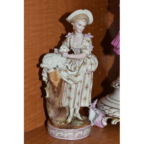 728 - THREE LATE 19TH / EARLY 20TH CENTURY CONTINENTAL PORCELAIN FIGURES, comprising a French centrepiece ... 