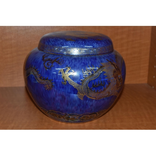 730 - A WEDGWOOD DRAGON LUSTRE GINGER JAR AND COVER, pattern Z4829, the exterior with mottled blue lustre ... 