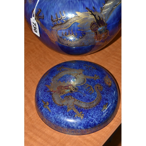 730 - A WEDGWOOD DRAGON LUSTRE GINGER JAR AND COVER, pattern Z4829, the exterior with mottled blue lustre ... 