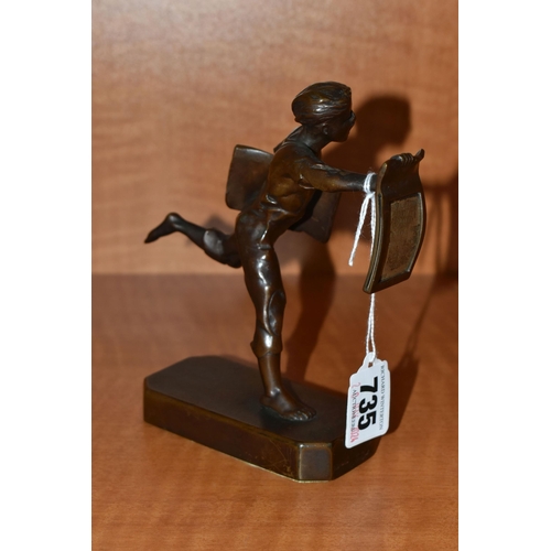 735 - A 1930'S POLITAL INTEREST BRONZE FIGURE OF A BARE FOOTED NEWSPAPER BOY POSED AS RUNNING, with a news... 