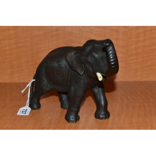 737 - A LATE 19TH CENTURY MEIJI PERIOD JAPANESE BRONZE FIGURE OF AN ELEPHANT WITH TRUNK RAISED, remnants o... 