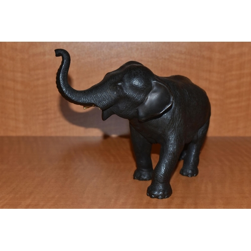 737 - A LATE 19TH CENTURY MEIJI PERIOD JAPANESE BRONZE FIGURE OF AN ELEPHANT WITH TRUNK RAISED, remnants o... 