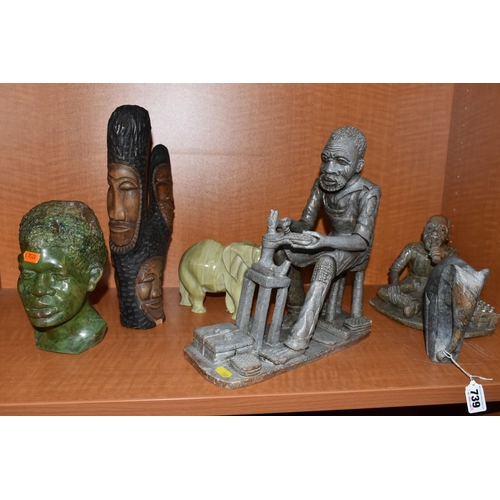 739 - A COLLECTION OF SIX AFRICAN STONE AND TREEN FIGURAL CARVINGS, comprising two sculpted as men, one a ... 