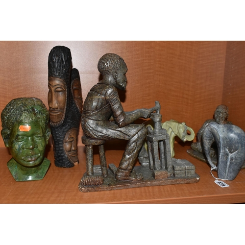 739 - A COLLECTION OF SIX AFRICAN STONE AND TREEN FIGURAL CARVINGS, comprising two sculpted as men, one a ... 