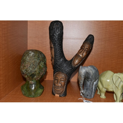 739 - A COLLECTION OF SIX AFRICAN STONE AND TREEN FIGURAL CARVINGS, comprising two sculpted as men, one a ... 