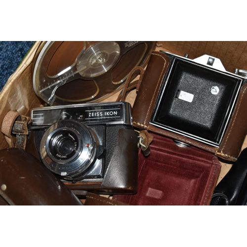 741 - A CASED POLAROID LAND CAMERA MODEL J66 AND A BOX OF ASSORTED CAMERAS AND BINOCULARS, including a pai... 