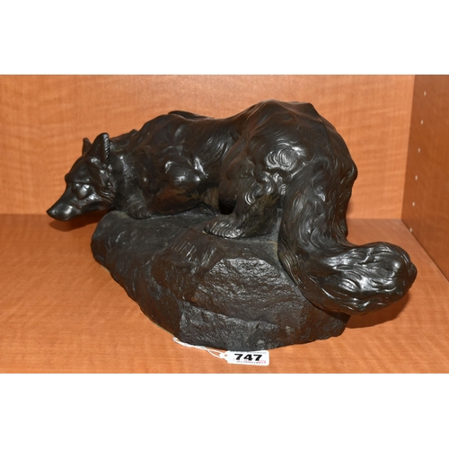 747 - A BRONZED RESIN SCULPTURE OF A CROUCHING FOX, AFTER BARTELIER, cast on a naturalistic base, height 1... 