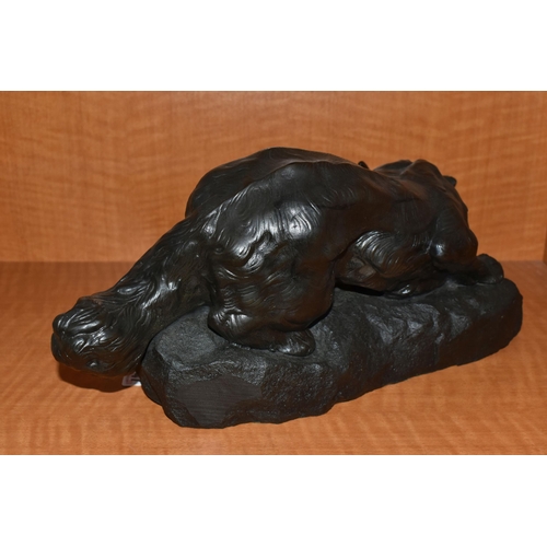 747 - A BRONZED RESIN SCULPTURE OF A CROUCHING FOX, AFTER BARTELIER, cast on a naturalistic base, height 1... 