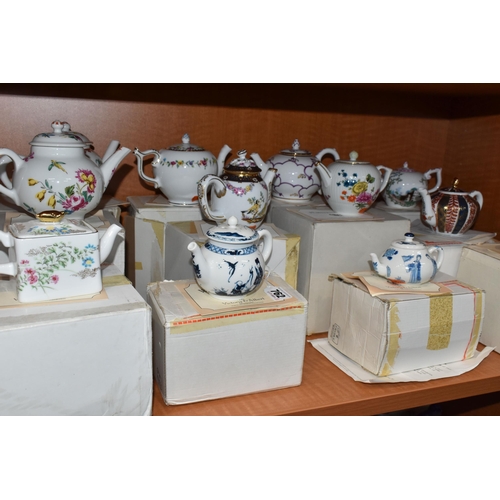 762 - A COLLECTION OF TWELVE BOXED FRANKLIN MINT 'THE VICTORIA & ALBERT MUSEUM PORCELAIN TEAPOT COLLECTION... 