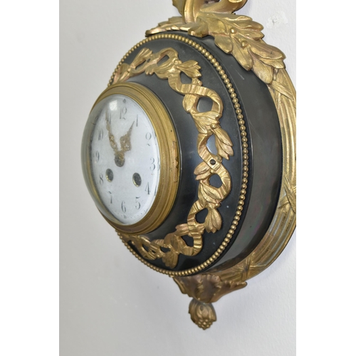 770 - A LATE 19TH / EARLY 20TH CENTURY CARTEL CLOCK BY SAMUEL MARTI, cast gilt metal ribbon and wreath cas... 