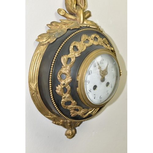 770 - A LATE 19TH / EARLY 20TH CENTURY CARTEL CLOCK BY SAMUEL MARTI, cast gilt metal ribbon and wreath cas... 