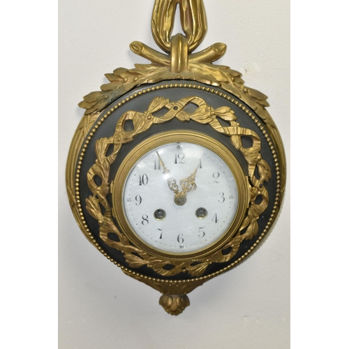 770 - A LATE 19TH / EARLY 20TH CENTURY CARTEL CLOCK BY SAMUEL MARTI, cast gilt metal ribbon and wreath cas... 