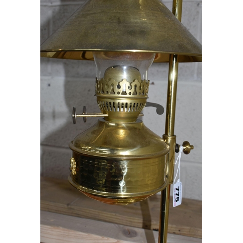 775 - A MODERN BRASS OIL LAMP OF EARLY 20TH CENTURY STYLE, bears Pullman emblem to the reservoir, on an ad... 