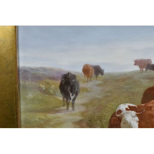 778 - A LATE 19TH CENTURY GILT FRAMED PORCELAIN PLAQUE PAINTED WITH CATTLE WATERING, unsigned and unmarked... 