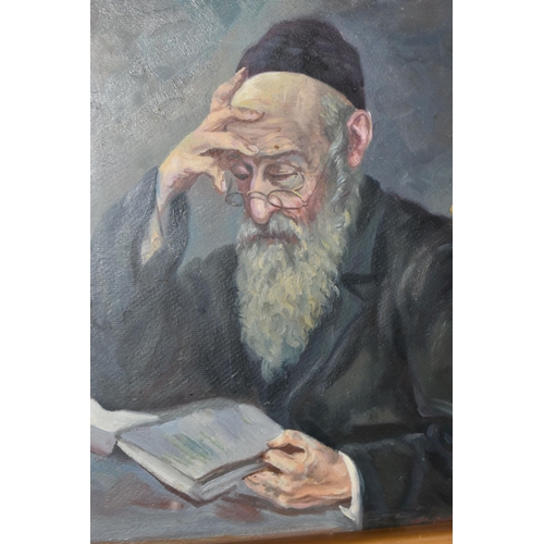 783 - A MID 20TH CENTURY PORTRAIT OF A RABBI, a seated Rabbi is reading from a book, his glasses are perch... 