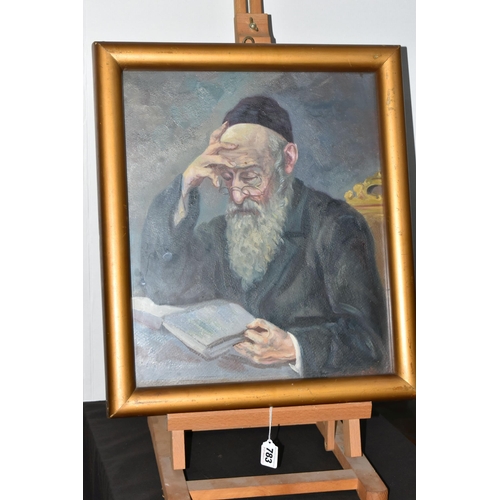 783 - A MID 20TH CENTURY PORTRAIT OF A RABBI, a seated Rabbi is reading from a book, his glasses are perch... 