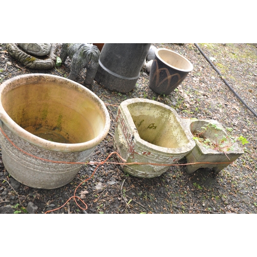 1014 - A COLLECTION OF THREE PLANT POTS comprising of an earthenware with diameter of 44cm, a square planer... 