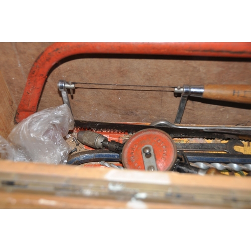 1052 - A VINTAGE CARPENTERS TOOLCHEST with drop down half front concealing one internal drawer and containi... 