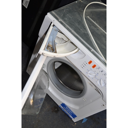 1064 - AN INDESIT IWME146 INTEGRATED WASHING MACHINE width 60cm depth 56cm height 83cm (PAT pass, spin cycl... 