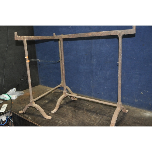 1076 - A PAIR OF VICTORIAN CAST IRON TABLE TRESTLES height 73cm width for top 73cm (pitted surface rust)