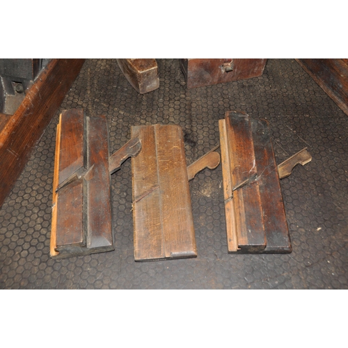 1088 - A COLLECTION OF VINTAGE WOOD PLANES including a steel footed and hardwood plane stamped C Mallson, a... 