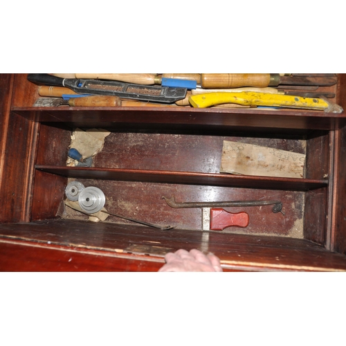 1089 - A LARGE VINTAGE CARPENTERS TOOLBOX with a pine outer carcass, steel banding, mahogany top, interior ... 