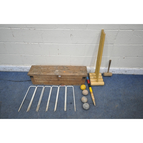 1278 - QUAIFE AND LILLEY LTD, A VINTAGE CROQUET SET, comprising four mallets, four balls, six hoops, one ce... 