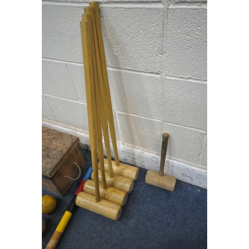 1278 - QUAIFE AND LILLEY LTD, A VINTAGE CROQUET SET, comprising four mallets, four balls, six hoops, one ce... 