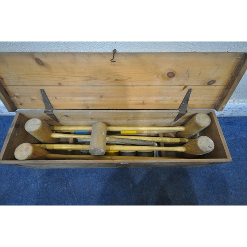 1278 - QUAIFE AND LILLEY LTD, A VINTAGE CROQUET SET, comprising four mallets, four balls, six hoops, one ce... 