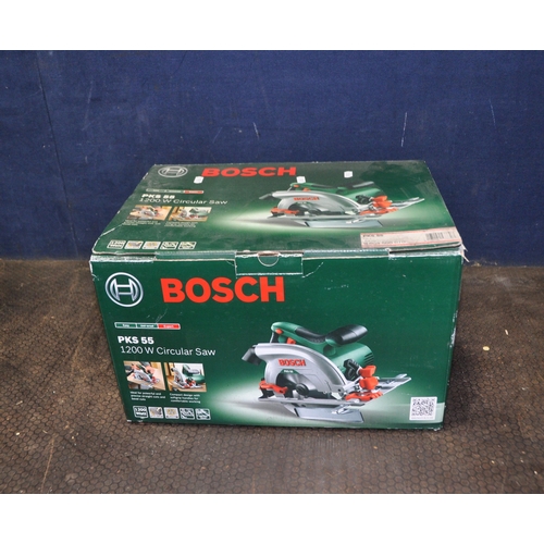 1065 - A BRAND NEW IN BOX BOSCH PKS55 CIRCULAR SAW 240v (no PAT due to new and unused), a tool rack and a m... 