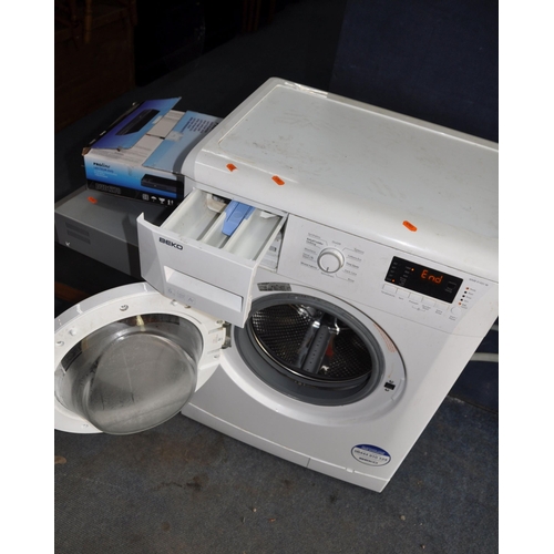 1075 - A BEKO WMB61431W SHALLOW WASHING MACHINE width 60cm depth 50cm height 84cm (PAT pass and spin cycle ... 