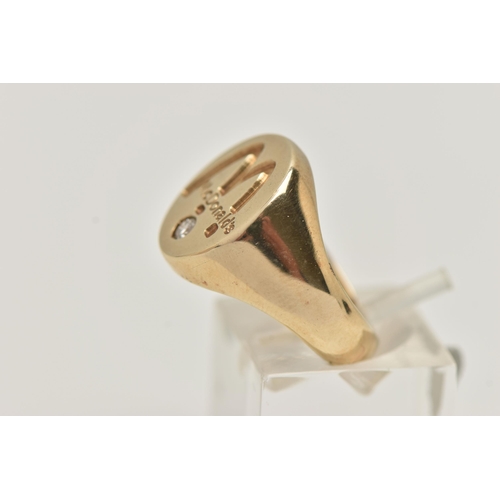 1 - A 9CT GOLD 'MCDONALDS' SIGNET RING, a yellow gold oval signet, signed 'McDonalds', flush set with a ... 